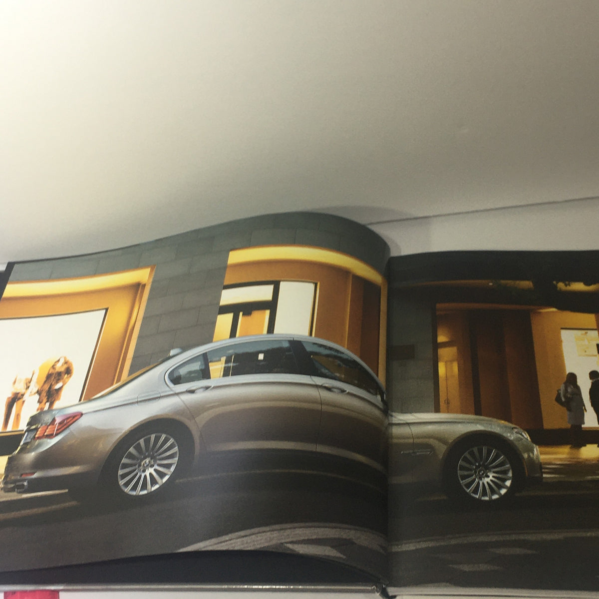 Interior page of the 2008 BMW 7 Series 750i 750Li Dealership Car Auto Brochure Catalog featuring a stunning side view of the car.