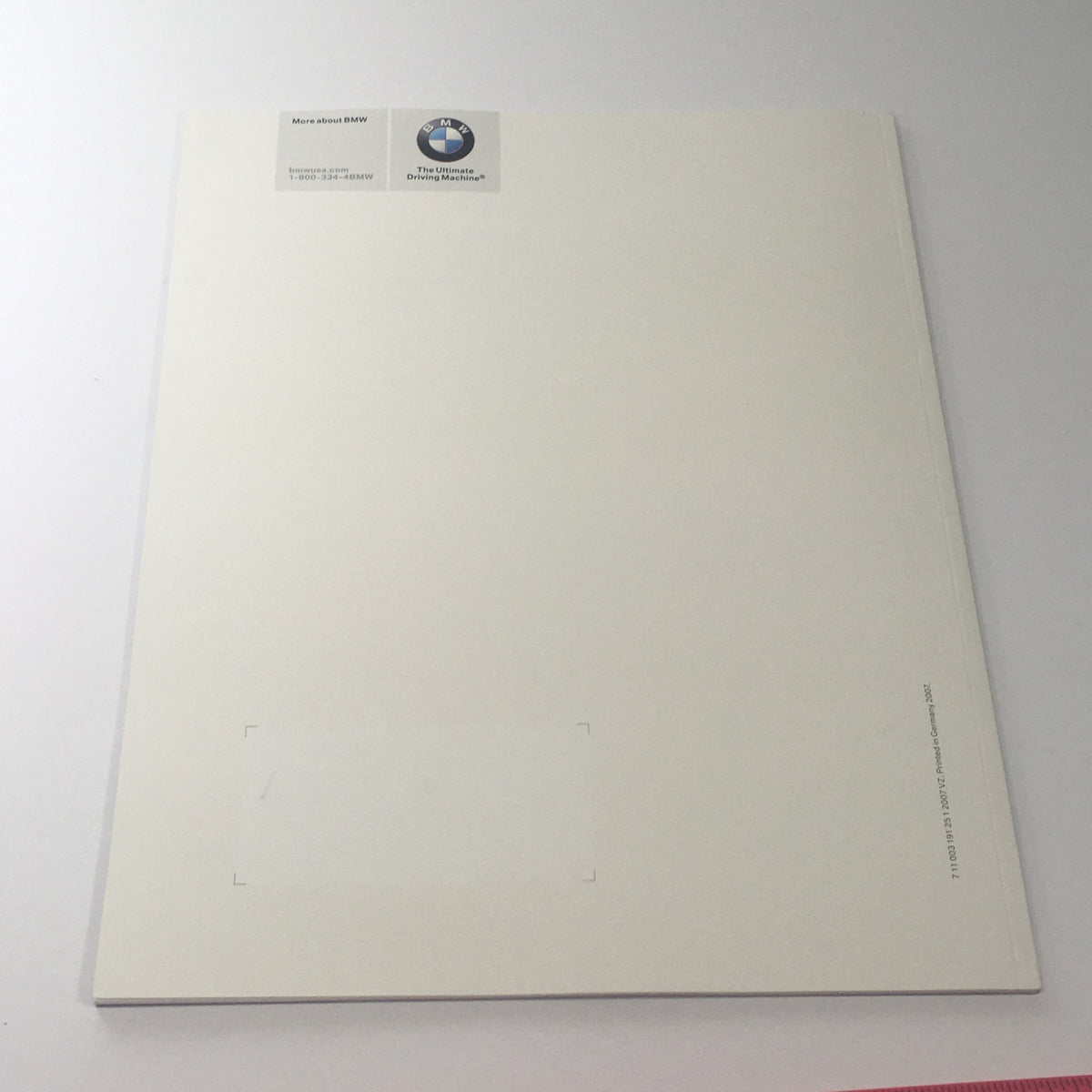 Back cover of the 2007 BMW Z4 Roadster Coupe 3.0i 3.0si Dealership Car Auto Brochure Catalog, featuring a plain design with the BMW logo at the top.