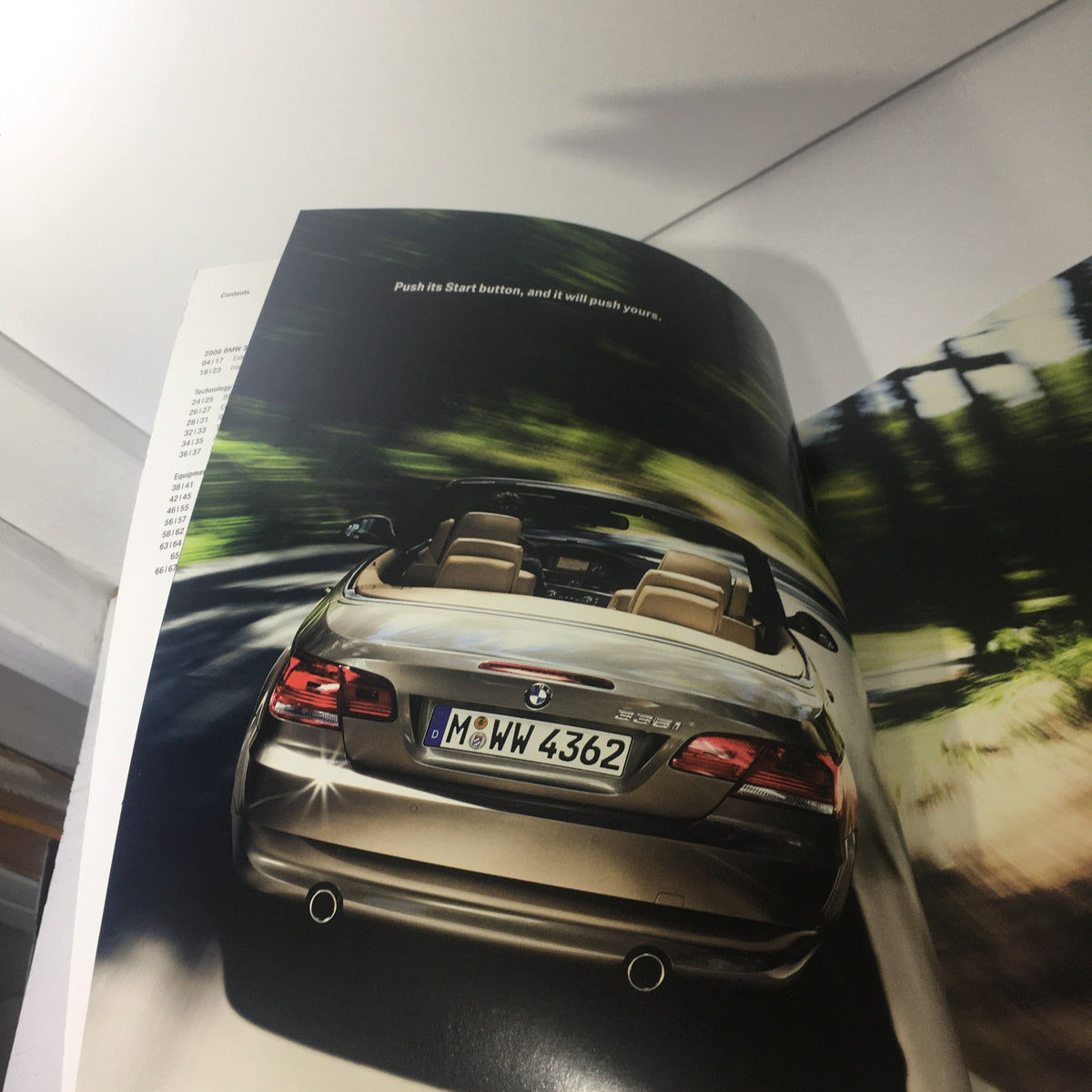 Inside view of the 2008 BMW 3 Series 328i 335i Convertible Brochure showcasing the rear of the convertible with a focus on the modern design.