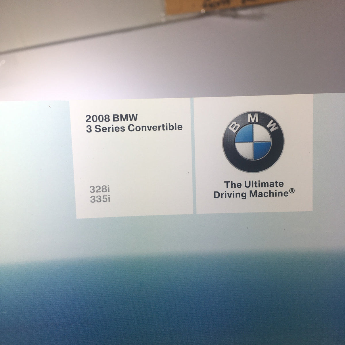 2008 BMW 3 Series 328i 335i Convertible dealership car brochure showcasing the BMW logo and tag line 'The Ultimate Driving Machine'.
