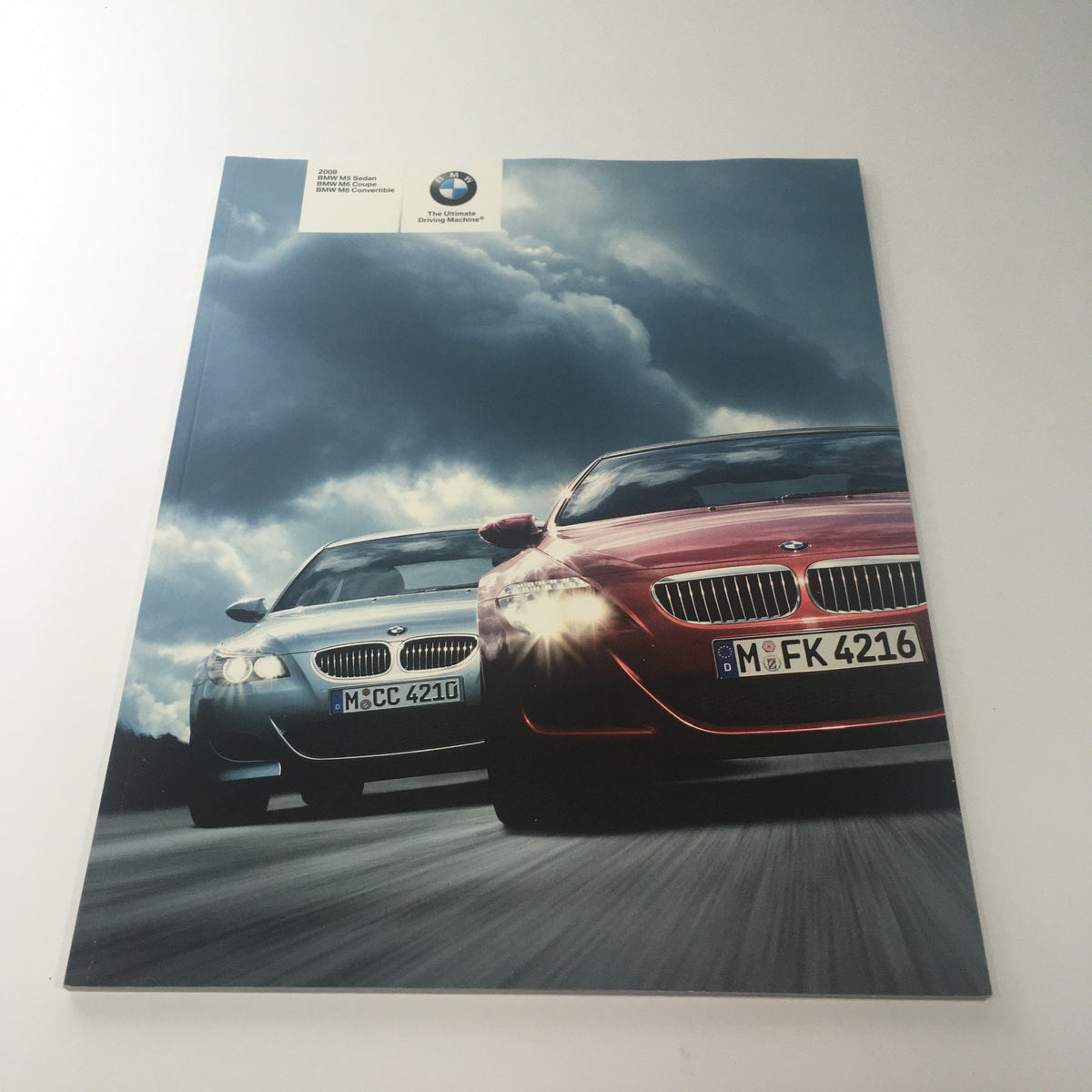 2008 BMW M5 Sedan M6 Coupe M6 Convertible Dealership Car Auto Brochure Catalog cover image showcasing two BMW cars in dramatic lighting.