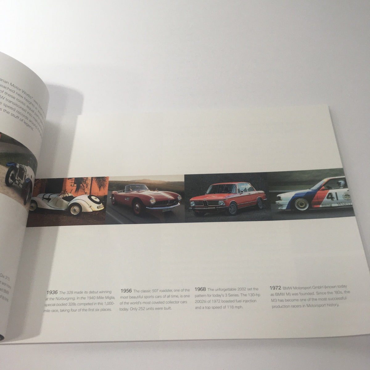 Interior page of the 2007 BMW Full Line 1936-1972 Series Dealership Car Auto Brochure Catalog showcasing iconic BMW models with timeline visuals from 1936 to 1972.