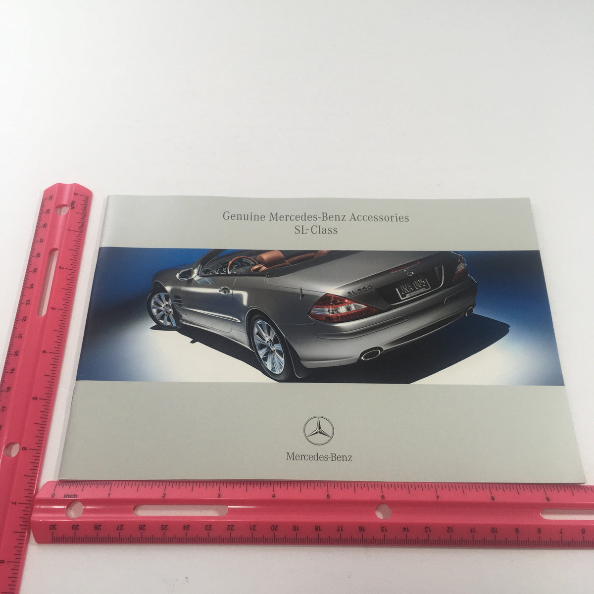 2006 Mercedes-Benz SL-Class Accessories Dealership Car Auto Brochure Catalog displayed with a ruler for size reference.