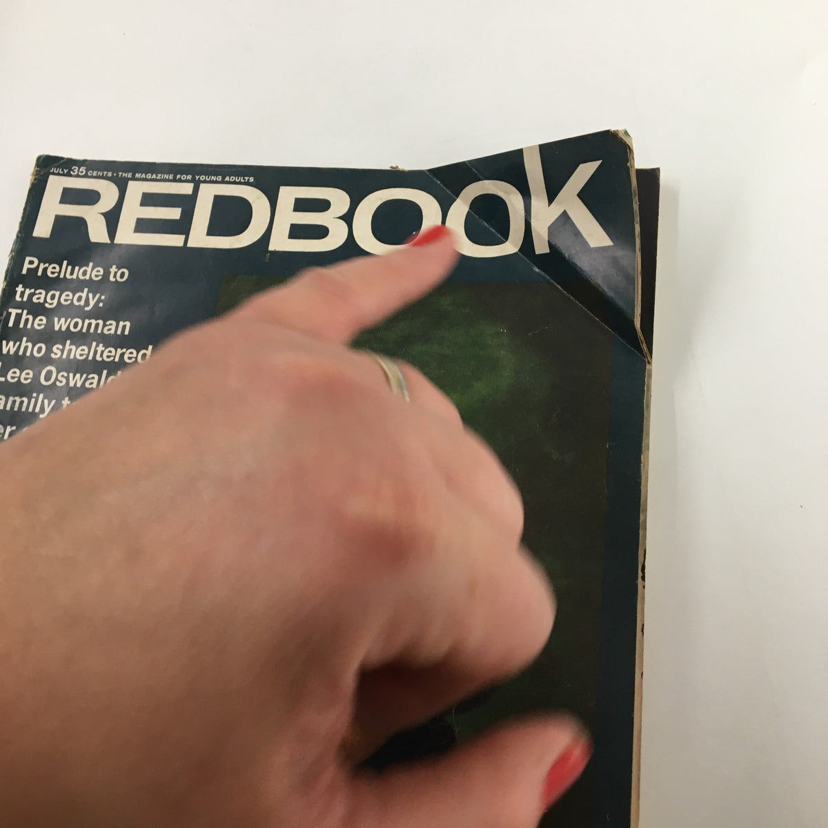 Close-up view of the cover of VTG Redbook Magazine July 1964 highlighting the headline articles and the magazine's vintage design.