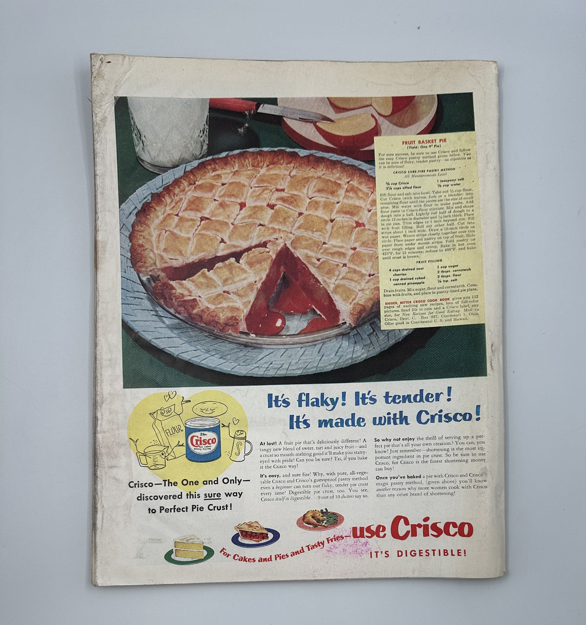 Vintage advertisement from Woman’s Home Companion Magazine November 1950 featuring a delicious dessert pie, emphasizing the use of Crisco for a flaky and tender crust. Ideal for cooking enthusiasts and collectors of retro kitchenware.
