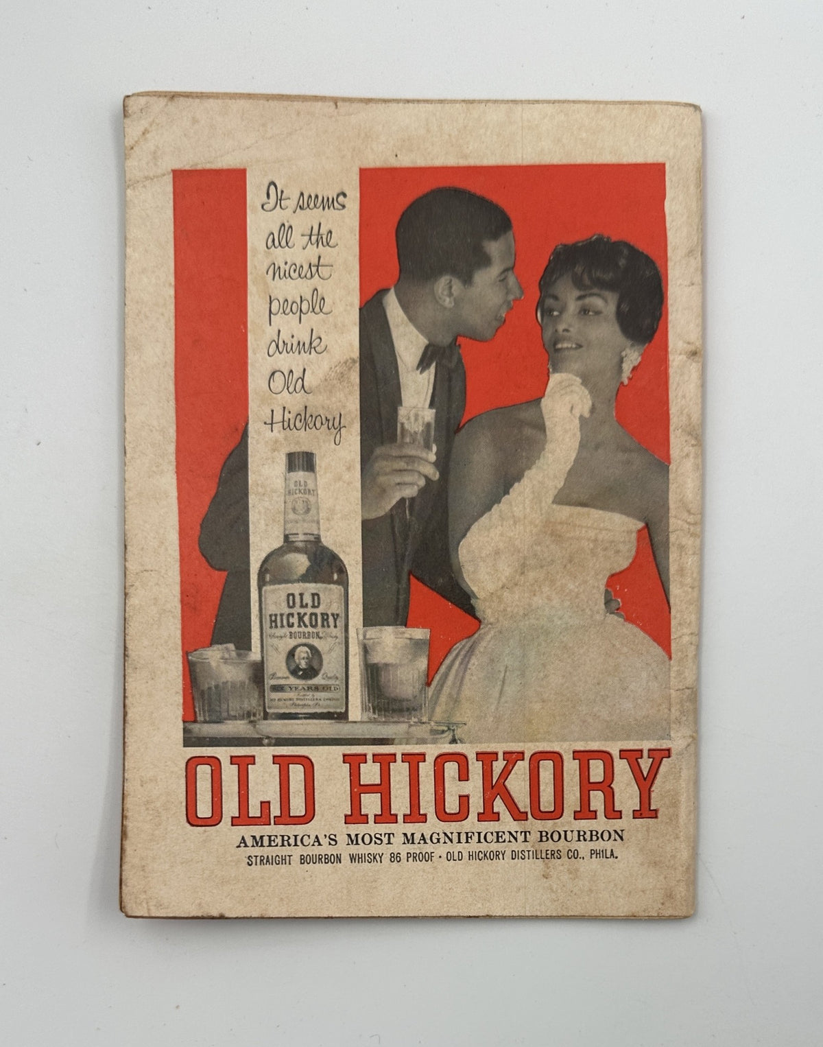 Advertisement from Jet Magazine May 27, 1965, featuring a couple enjoying Old Hickory bourbon whisky, with a slogan about it being favored by nice people.