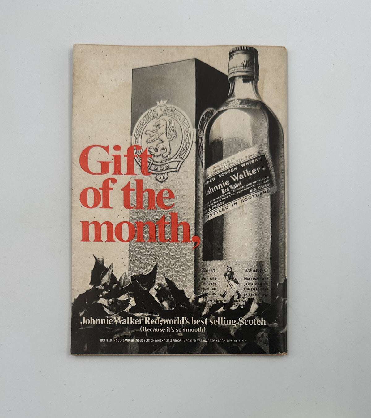 Advertisement page in Jet Magazine December 19, 1968 featuring 'Gift of the Month' for Johnnie Walker Scotch with an image of the bottle.