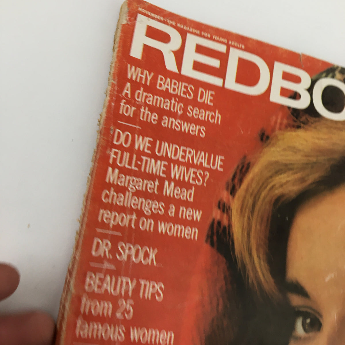 Detail of the VTG Redbook Magazine from November 1963 cover, showcasing the title 'Why Babies Die: A Dramatic Search for Answers' alongside other article headlines.