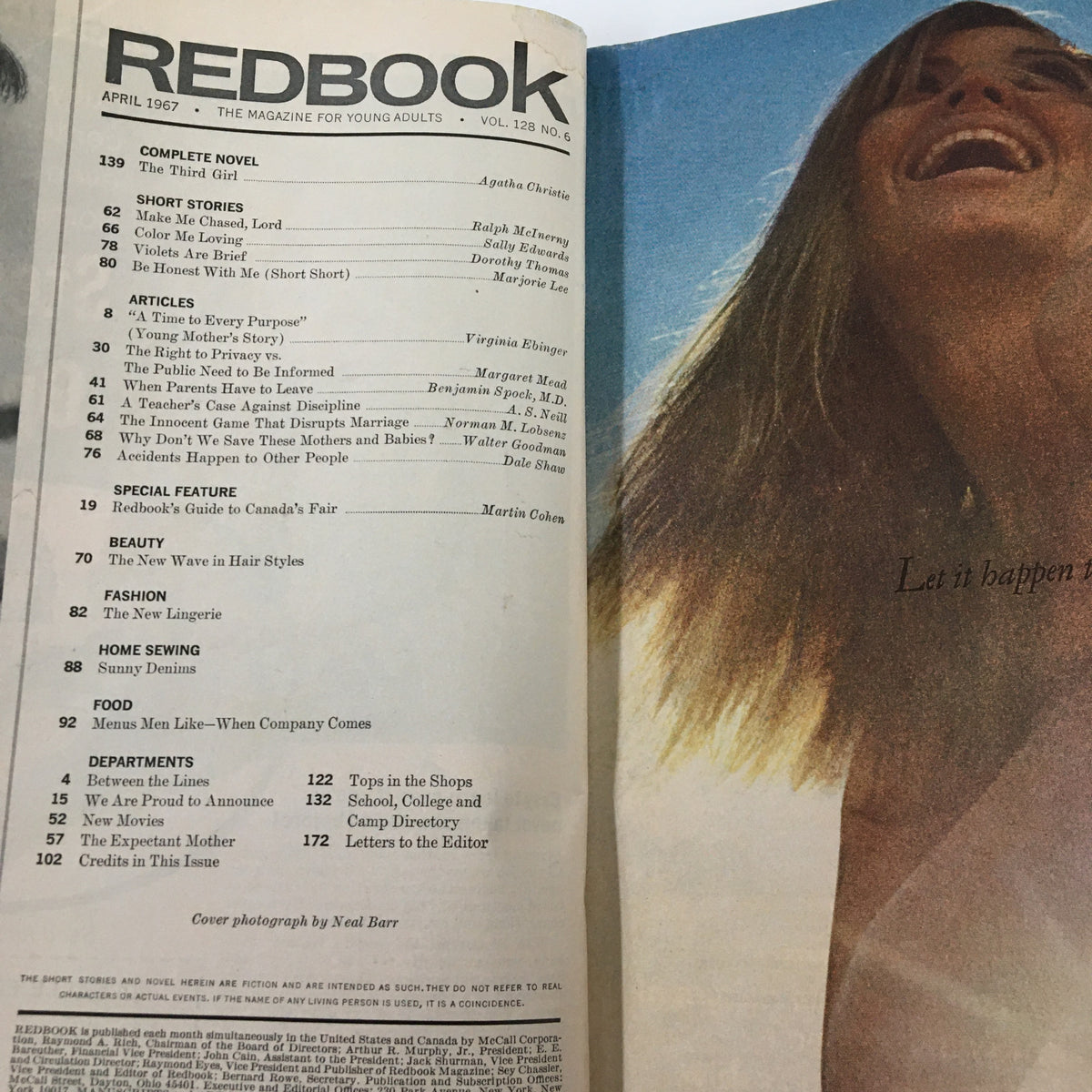 Interior page of Redbook Magazine, April 1967 listing contents including Agatha Christie stories, fashionable articles, and sections related to family vacations and home sewing.