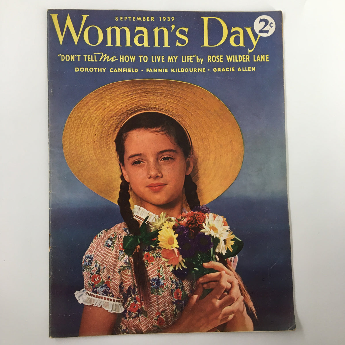 Cover of VTG Woman's Day Magazine from September 1939 featuring a young girl in a straw hat holding flowers, with the cover line "Don't Tell Me How to Live My Life"