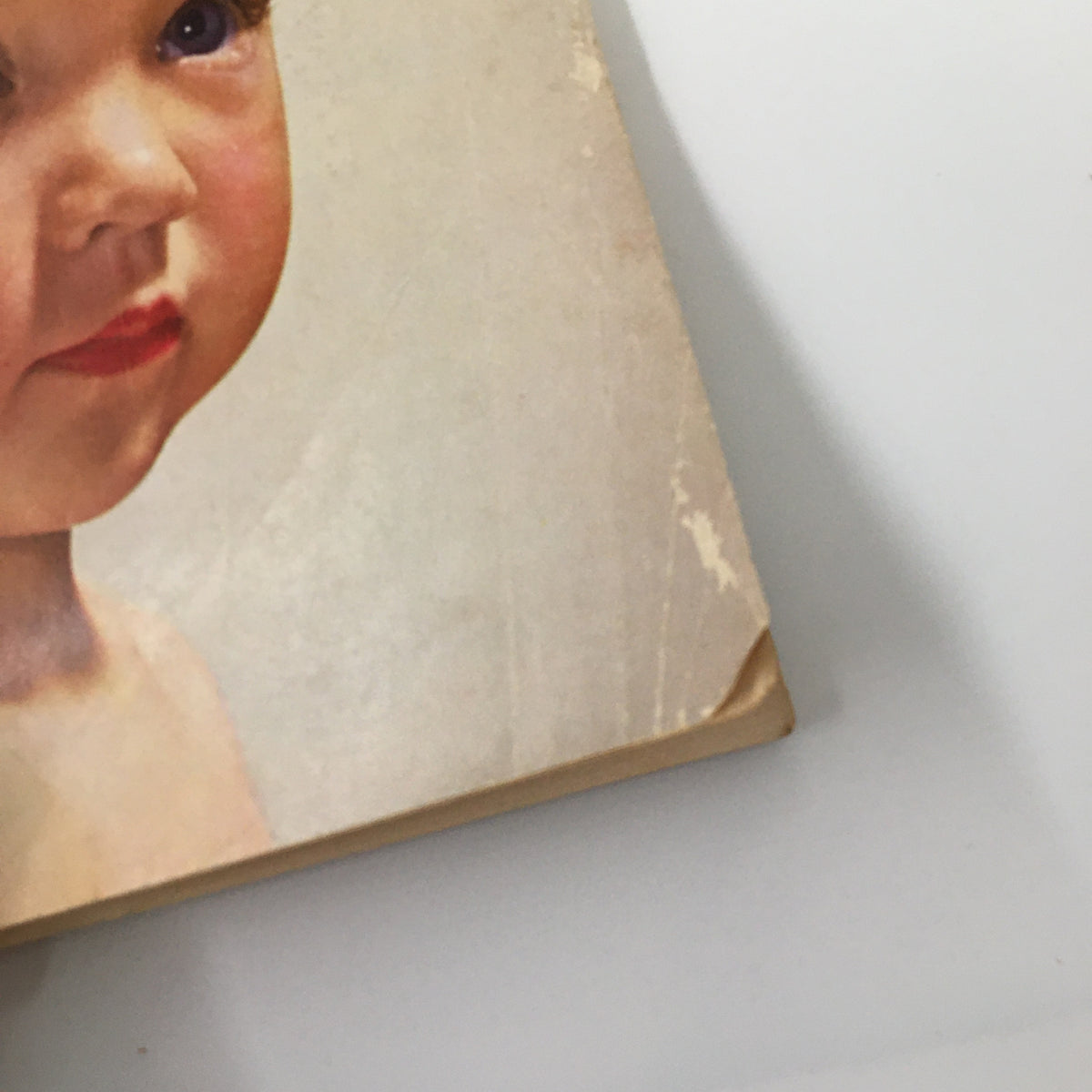 Detail view of the VTG Woman's Day Magazine July 1952 cover, showcasing the young girl's face and the classic magazine design.
