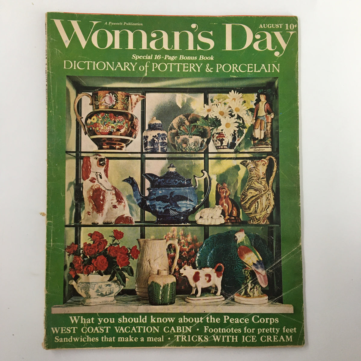 Cover of VTG Woman's Day Magazine August 1962 titled 'The Loneliest Woman in Town' featuring an array of pottery, porcelain, and floral designs, showcasing vintage aesthetics.