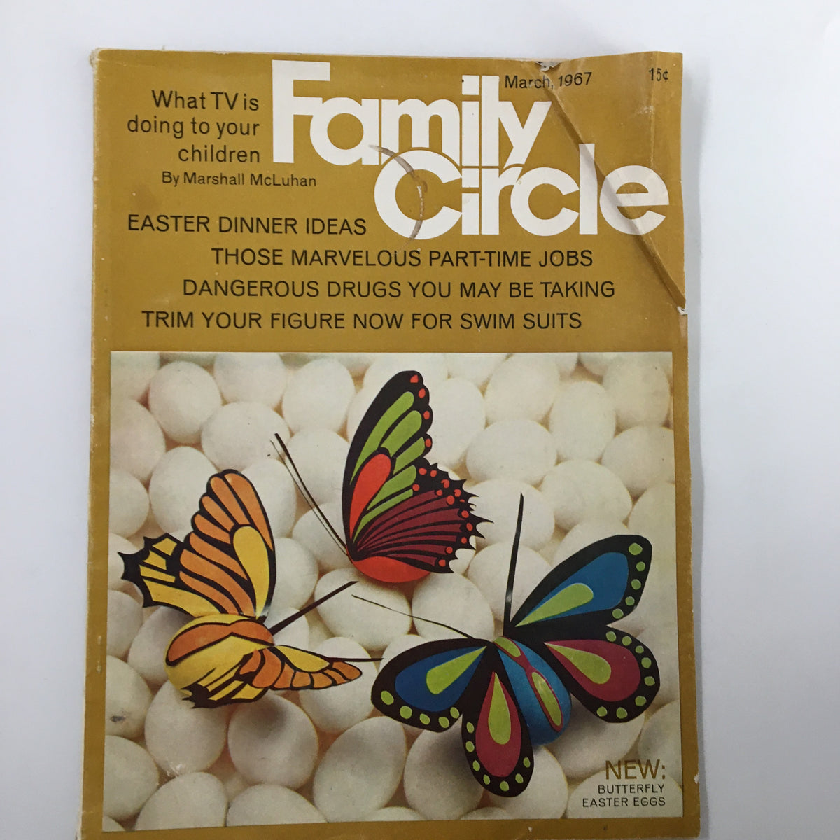 Cover of VTG Woman's Day Magazine March 1967 featuring colorful butterflies and Easter eggs, highlighting vintage lifestyle themes.