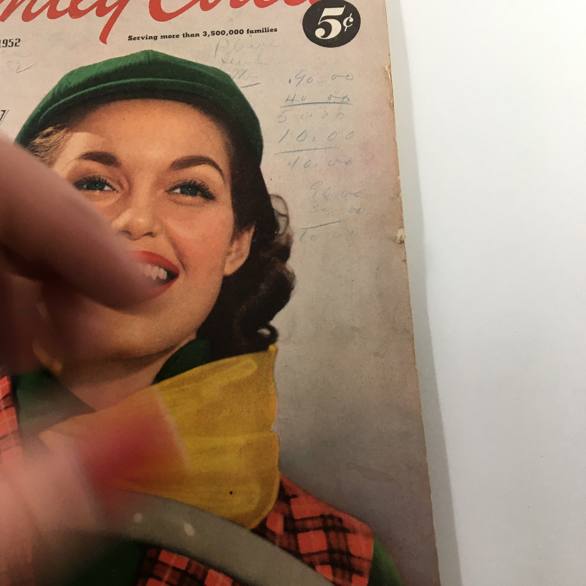 Focused view of the VTG Family Circle Magazine March 1952 cover displaying a youthful woman smiling brightly, advertising Easter Dinner From The Freezer.