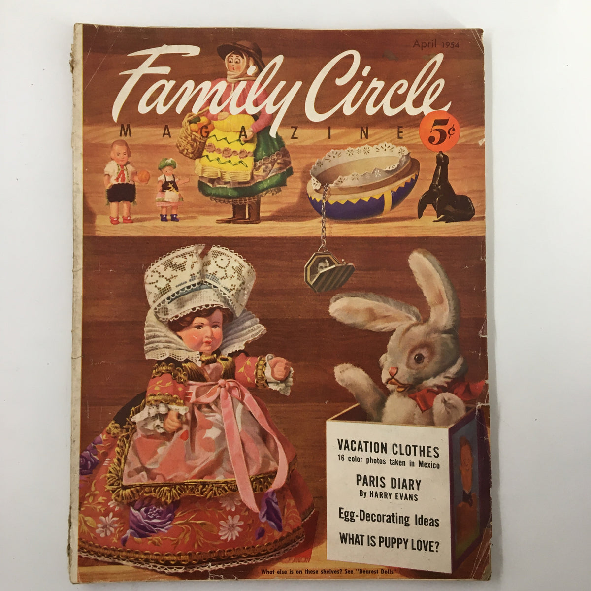 Cover of Vintage Family Circle Magazine April 1954 featuring egg-decorating ideas, dolls, and a bunny illustration.