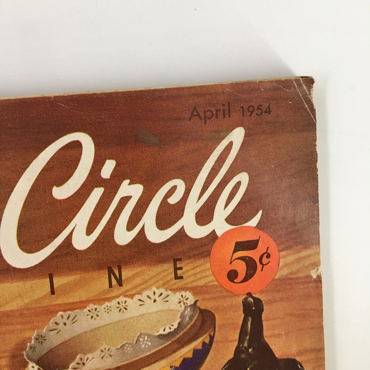 Cover of VTG Family Circle Magazine from April 1954 featuring egg-decorating ideas, with a price tag of 5 cents and vintage illustration elements.