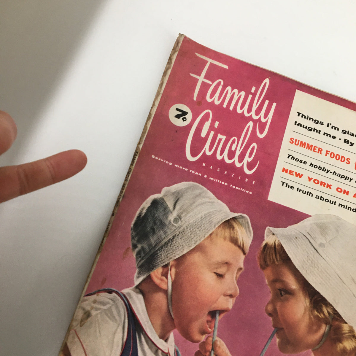 Cover of VTG Family Circle Magazine July 1956 featuring children wearing bonnets and the title prominently displayed.