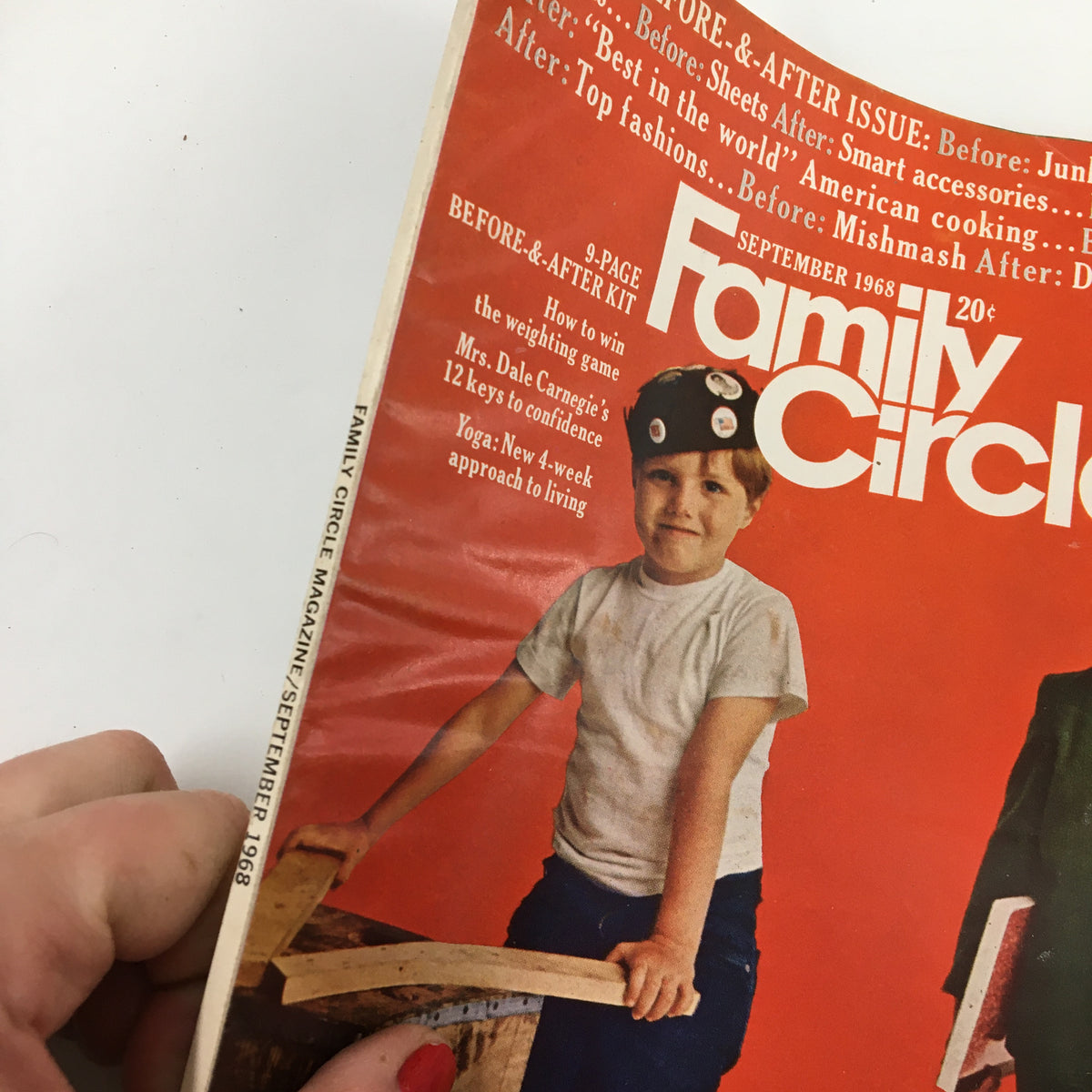 Cover of VTG Family Circle Magazine September 1968 showcasing a young boy holding wooden boards and wearing stickers, highlighting topics such as weight loss and confidence.