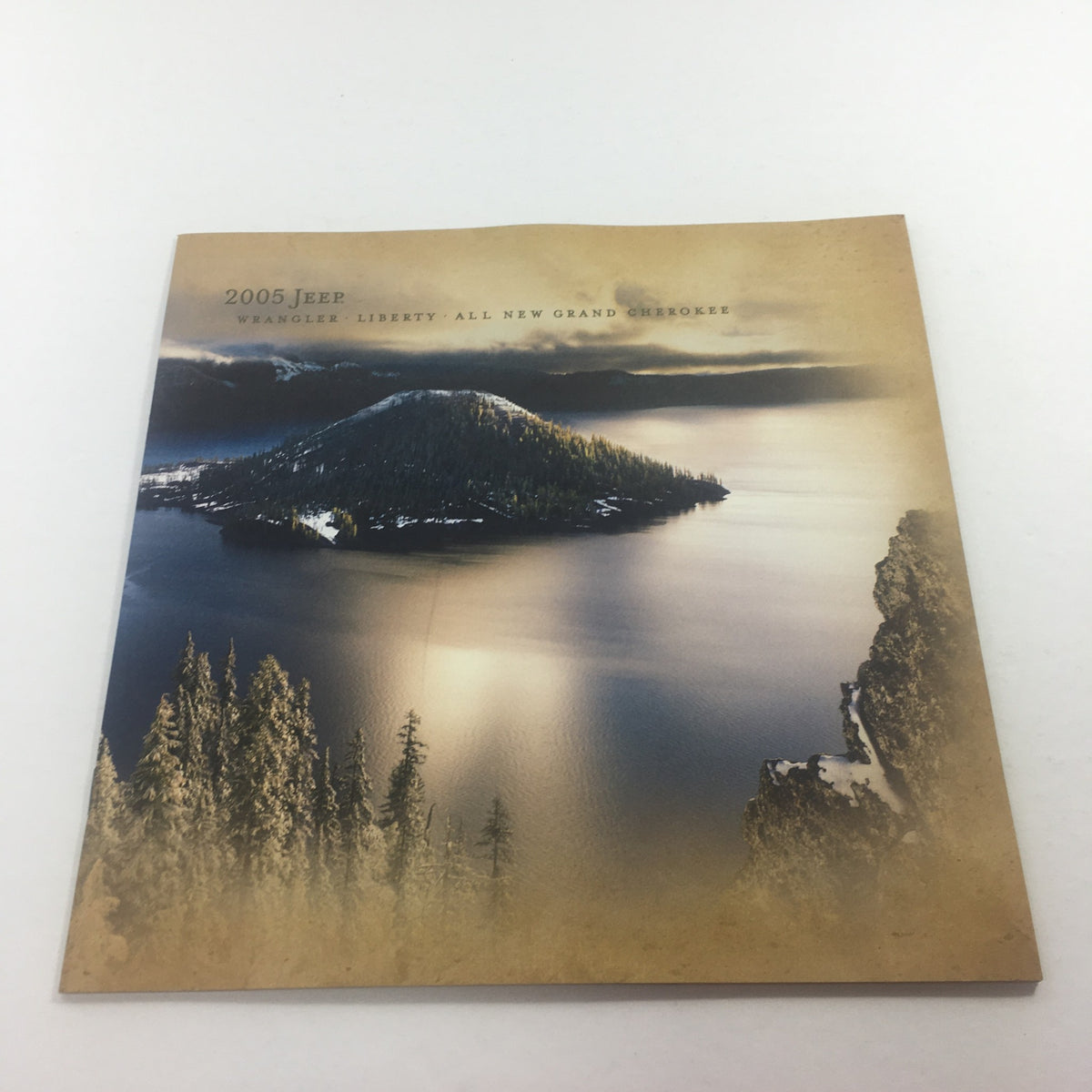 Cover of the 2005 Jeep Wrangler Liberty, Grand, Cherokee dealership car auto brochure catalog, featuring scenic lake view and mountains.