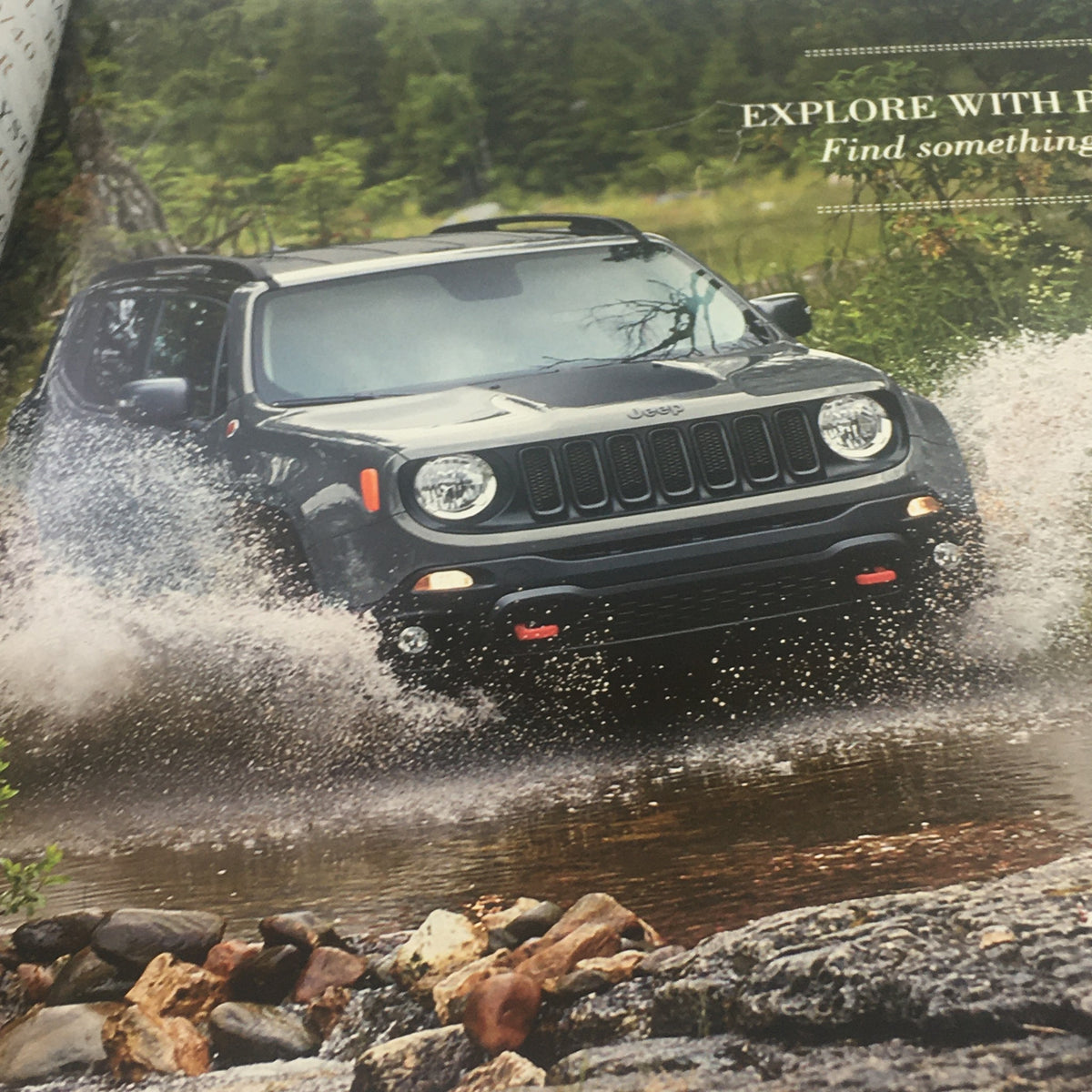 Image from the 2016 Jeep Renegade Dealership Car Auto Brochure Catalog showcasing the Jeep Renegade driving through water, emphasizing its off-road capabilities.