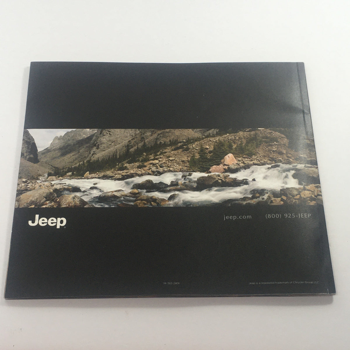 Back cover of the 2014 Jeep Wrangler 4x4 Dealership Car Auto Brochure featuring a scenic mountain river view and the Jeep logo.