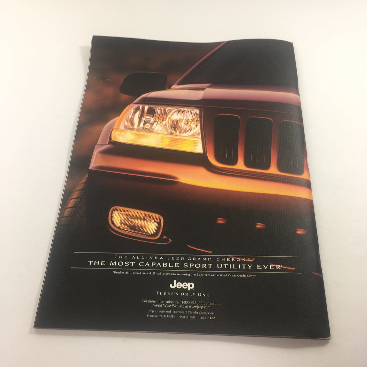 Back cover of the 1999 Jeep Grand Cherokee SUV Dealership Car Auto Brochure Catalog highlighting its capability and Jeep branding.