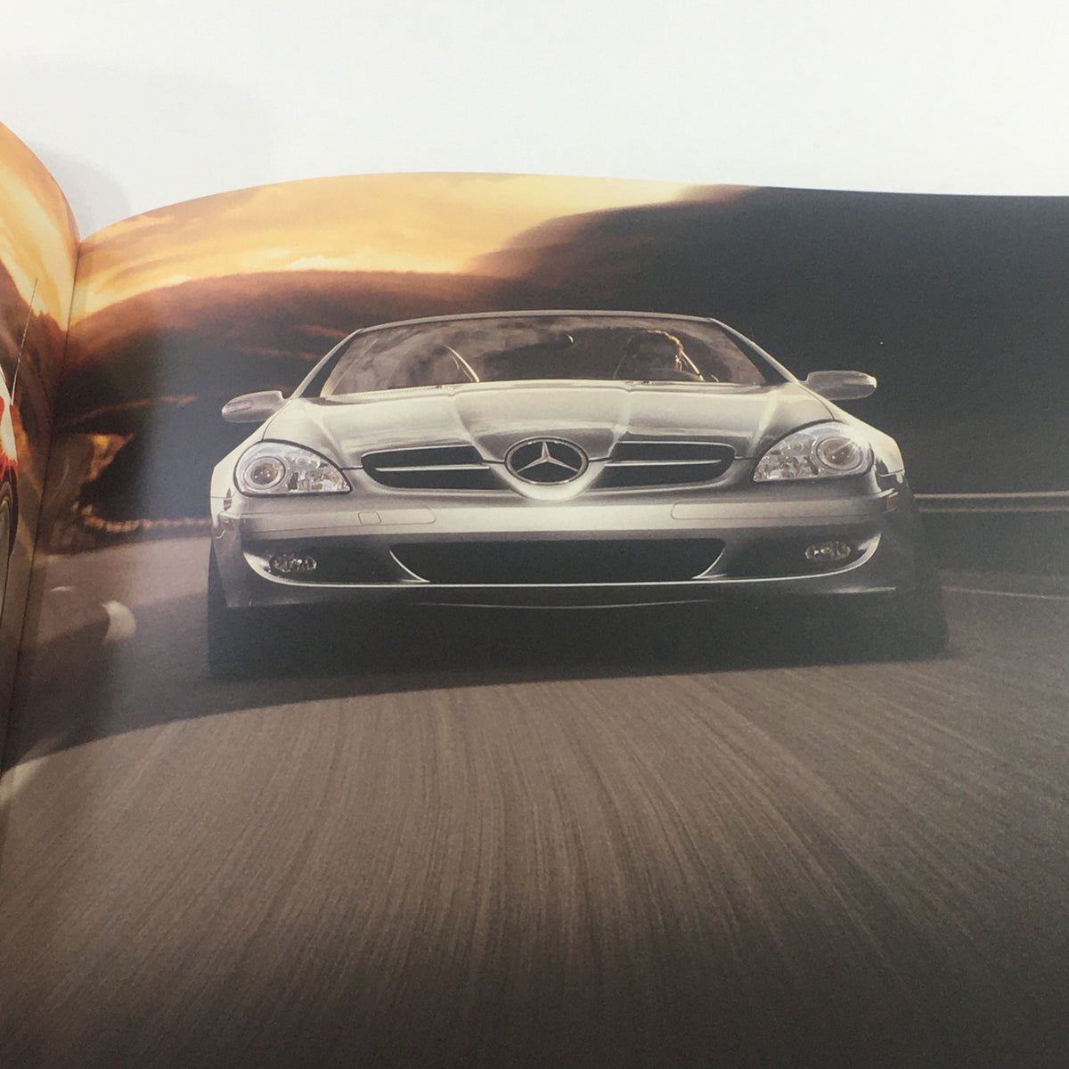 2008 Mercedes-Benz SLK-Class 280-350-55-AMG dealership car brochure showcasing a silver convertible sports car driving on an open road.