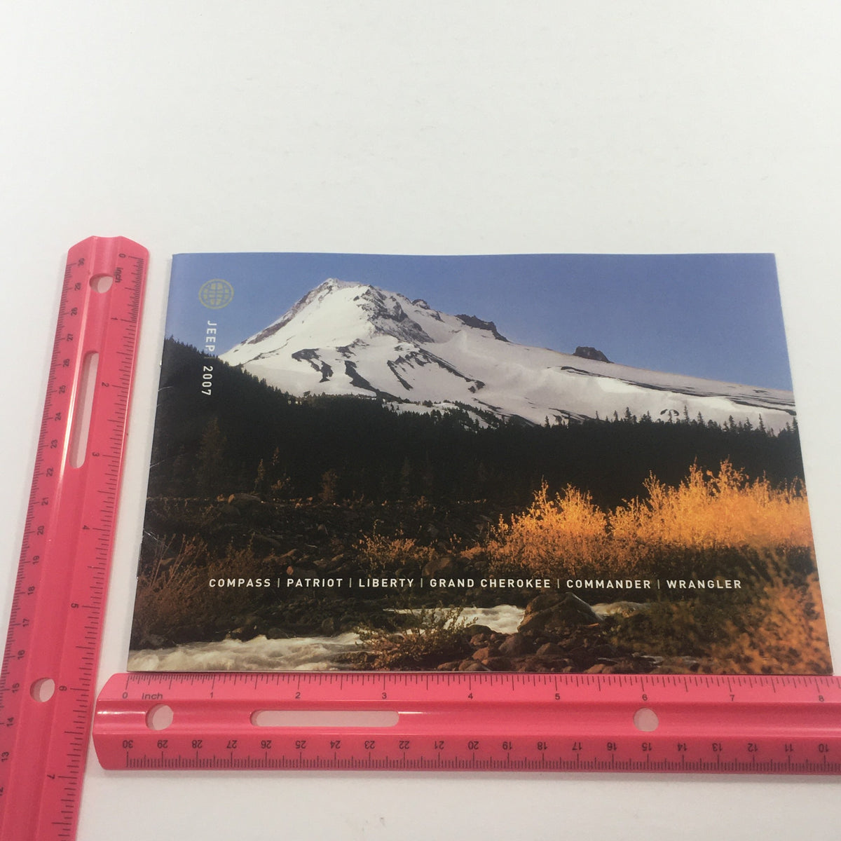 2007 Jeep Compass-Patriot-Liberty-Wrangler Dealership Car Auto Brochure Catalog showcasing a mountain landscape with Jeep models listed.