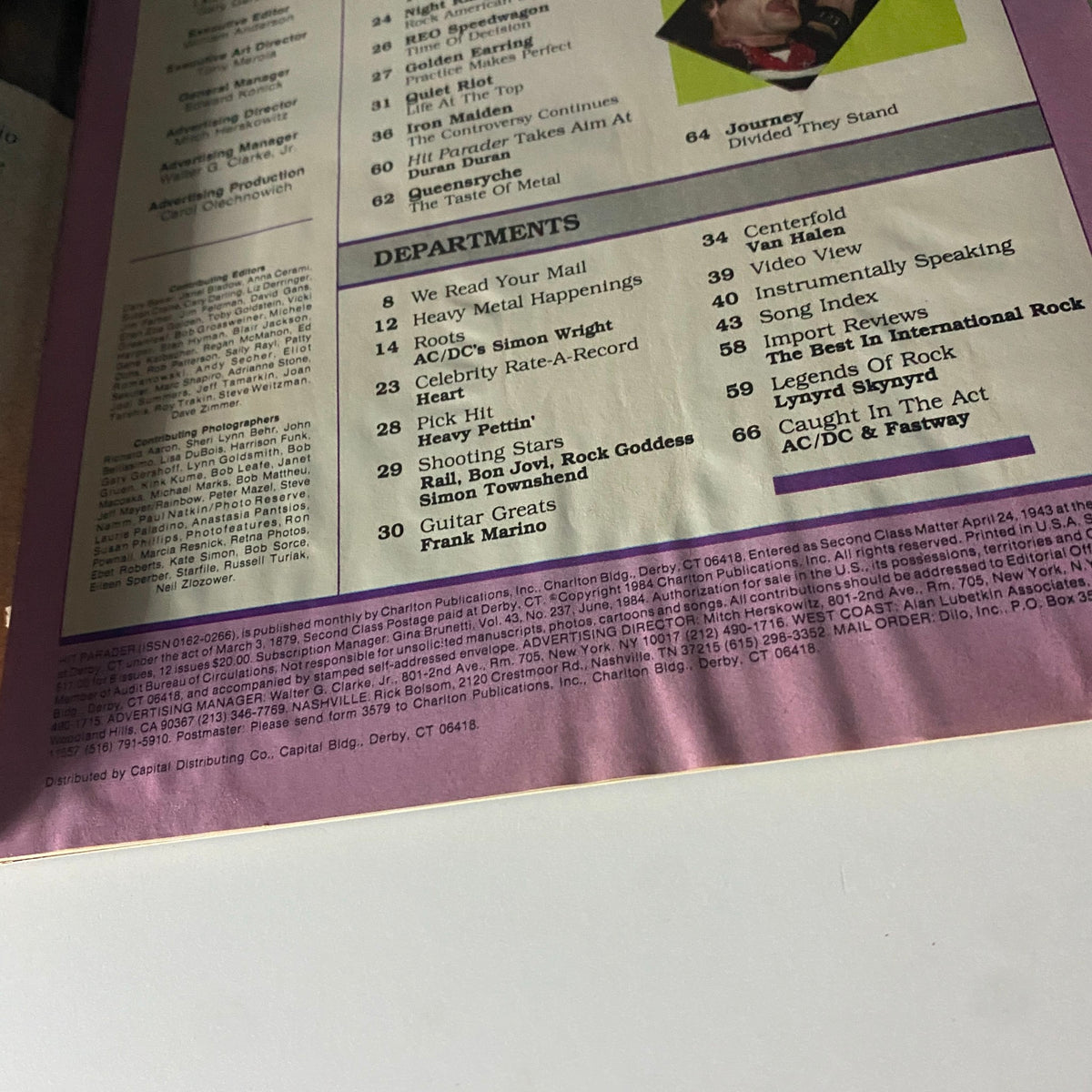 Back cover of Hit Parader Magazine June 1984, displaying the magazine's overall layout, featuring artist listings and advertising typical of vintage music publications.