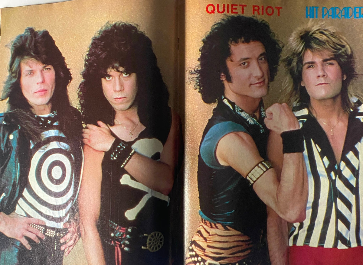 Centerfold of Quiet Riot in Hit Parader Magazine March 1984, featuring the band members in stylish rock attire. A prominent visual celebrating the energetic rock culture of the 1980s.