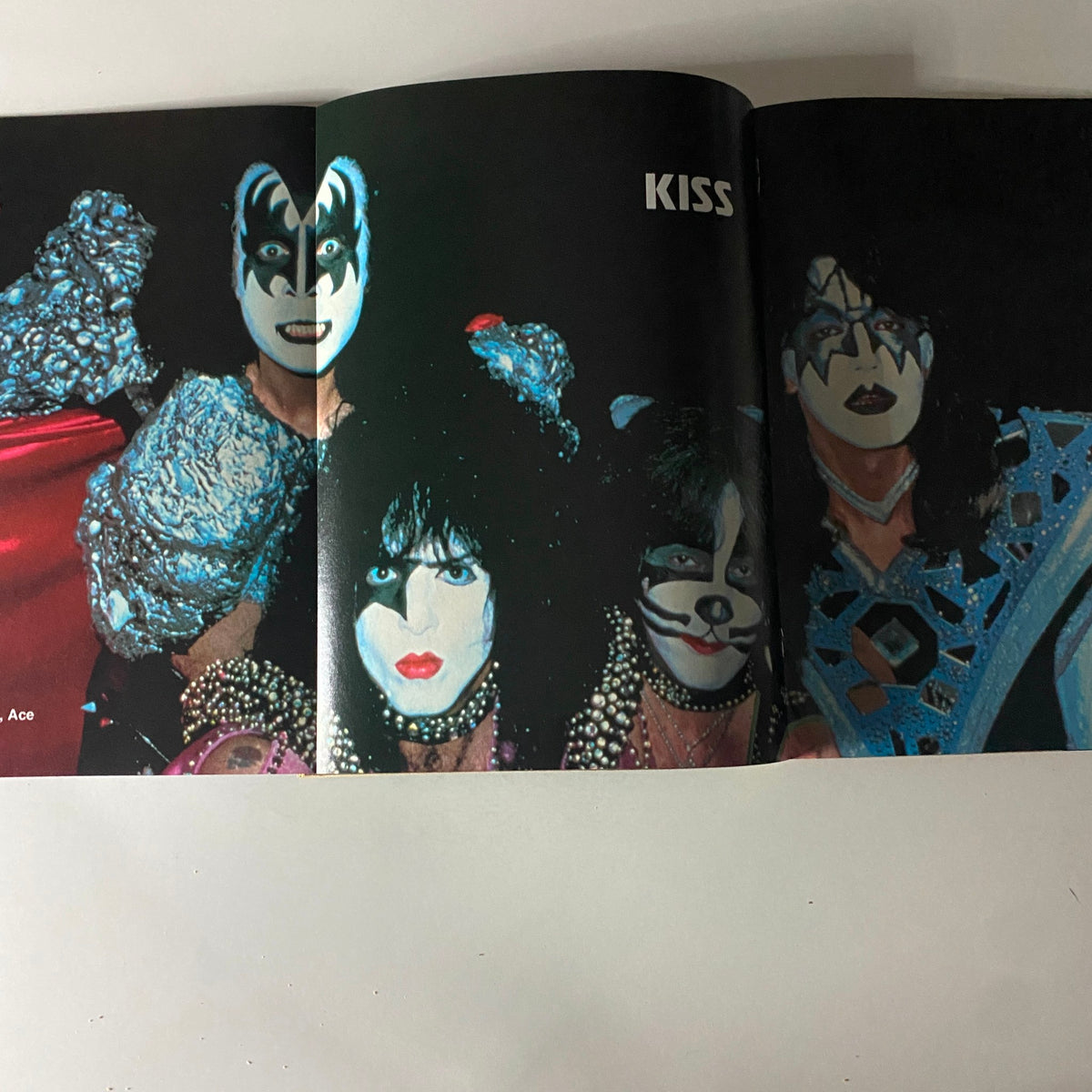 Vintage October 1980 edition of 16 Magazine featuring KISS, showcasing their iconic makeup and costumes in a centerfold spread.