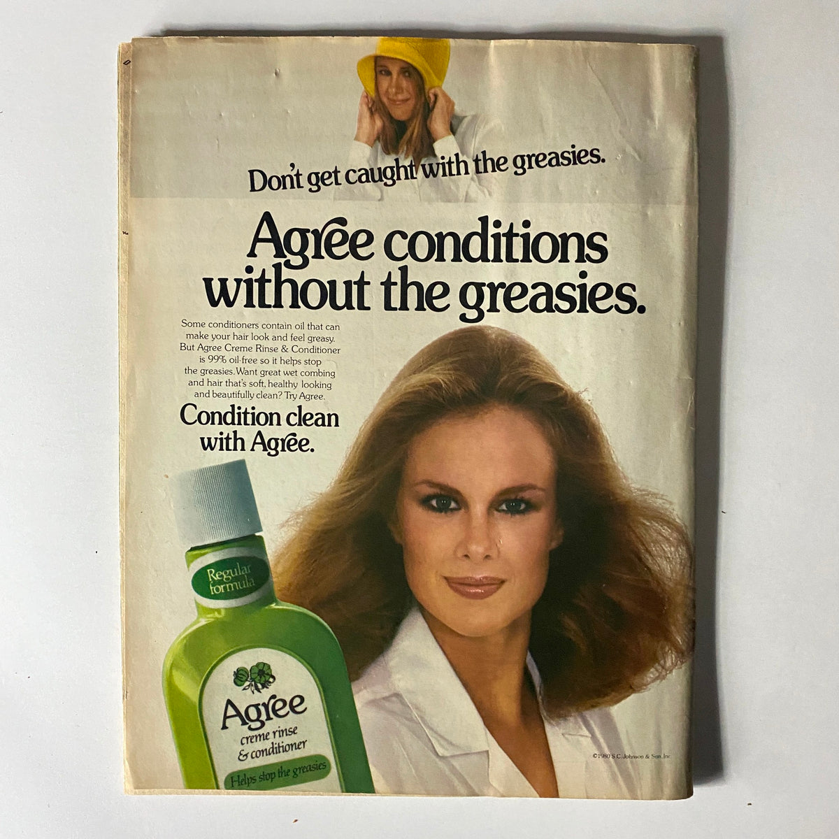 An advertisement for Agree conditioners, featuring a model with beautiful hair, promoting clean conditioning without greasiness, included in the January 1981 issue of 16 Magazine.