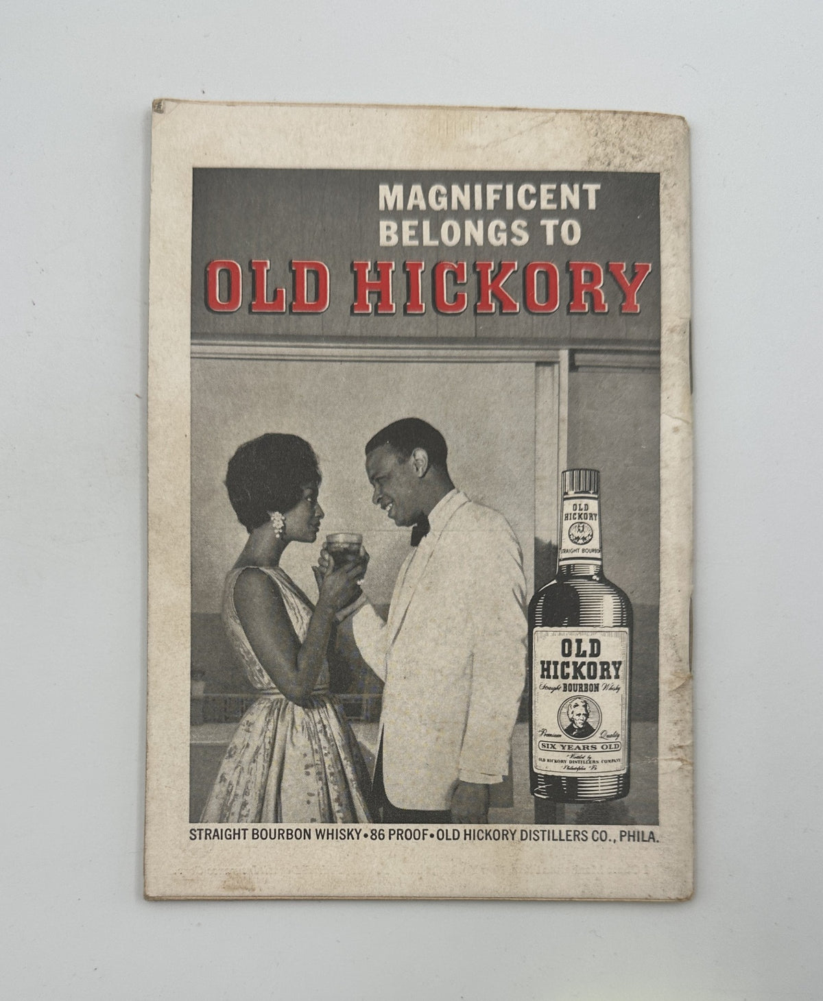 Cover image from Jet Magazine dated March 29, 1962, showcasing a classy couple toasting with drinks. The advert for Old Hickory Bourbon Whiskey highlights the sophisticated lifestyle associated with the brand.