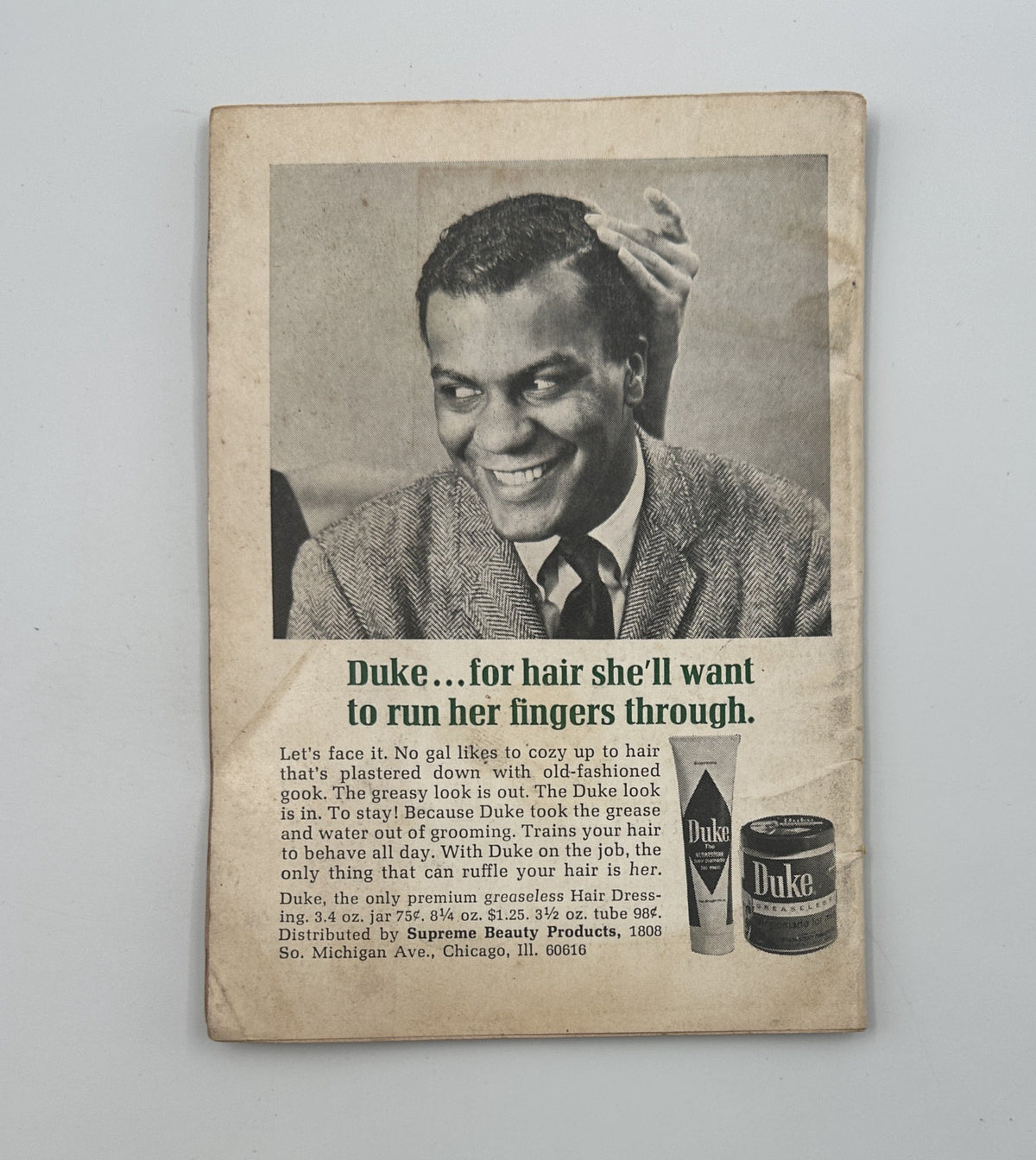 Back cover of Jet Magazine from May 2, 1968, advertising Duke Hair Dressing product with a close-up of a man and promotional text focusing on hair care.