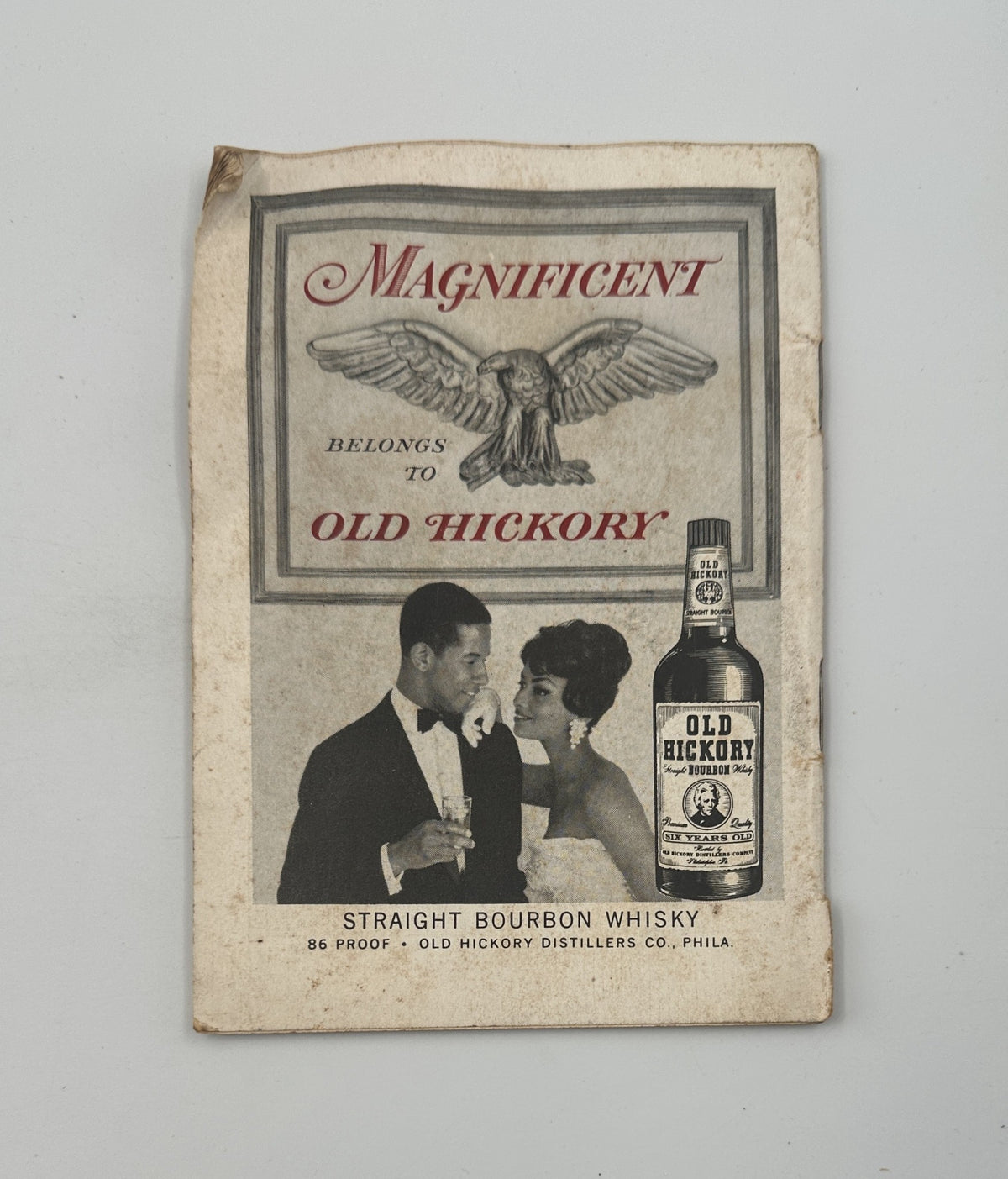 Advertisement from Jet Magazine dated February 23, 1961 featuring Old Hickory Straight Bourbon Whisky, showcasing a stylish couple, emphasizing luxury and lifestyle in the 1960s.