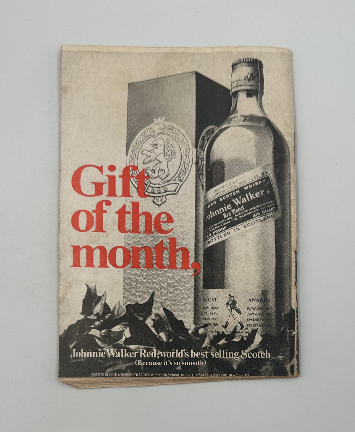 Advertisement in Jet Magazine January 2, 1969 promoting Johnnie Walker Scotch whiskey with the tagline 'Gift of the month.'