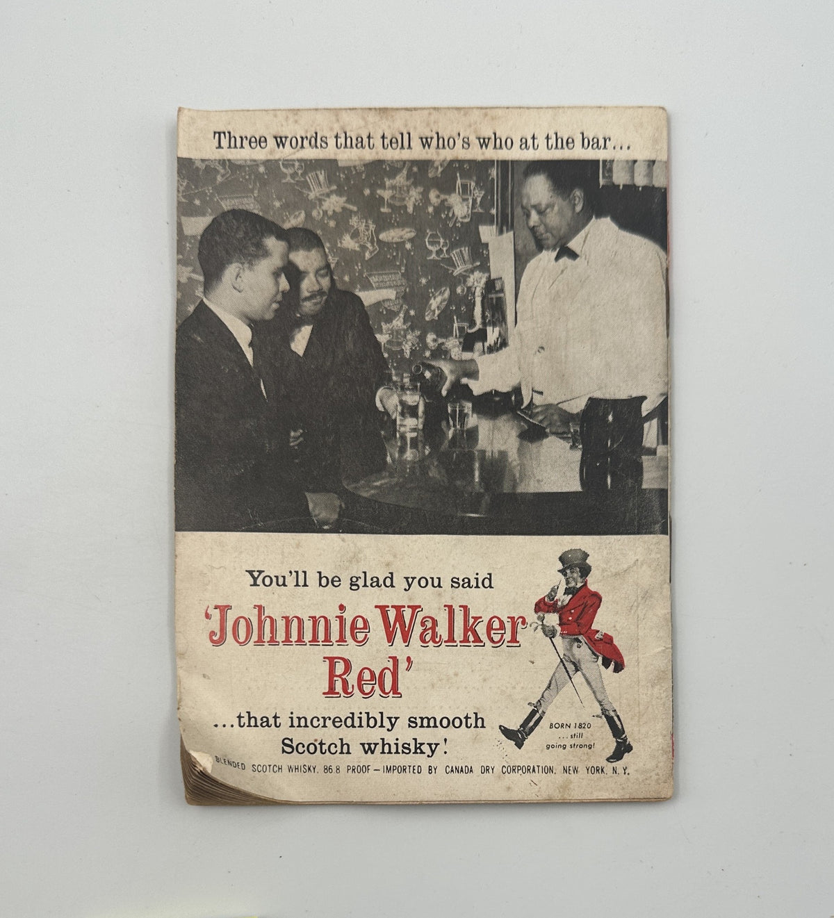 Advertisement page from Jet Magazine April 9, 1964, promoting Johnnie Walker Red Scotch whisky.