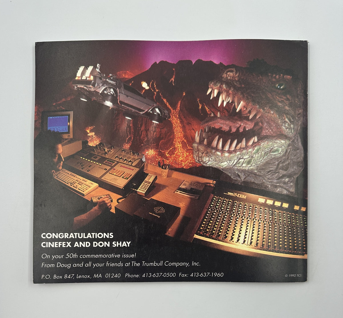 Back cover of Cinefex Magazine May 1992 No. 50, celebrating the 50th issue with a congratulatory note and a dramatic scene featuring a dinosaur and futuristic vehicle.