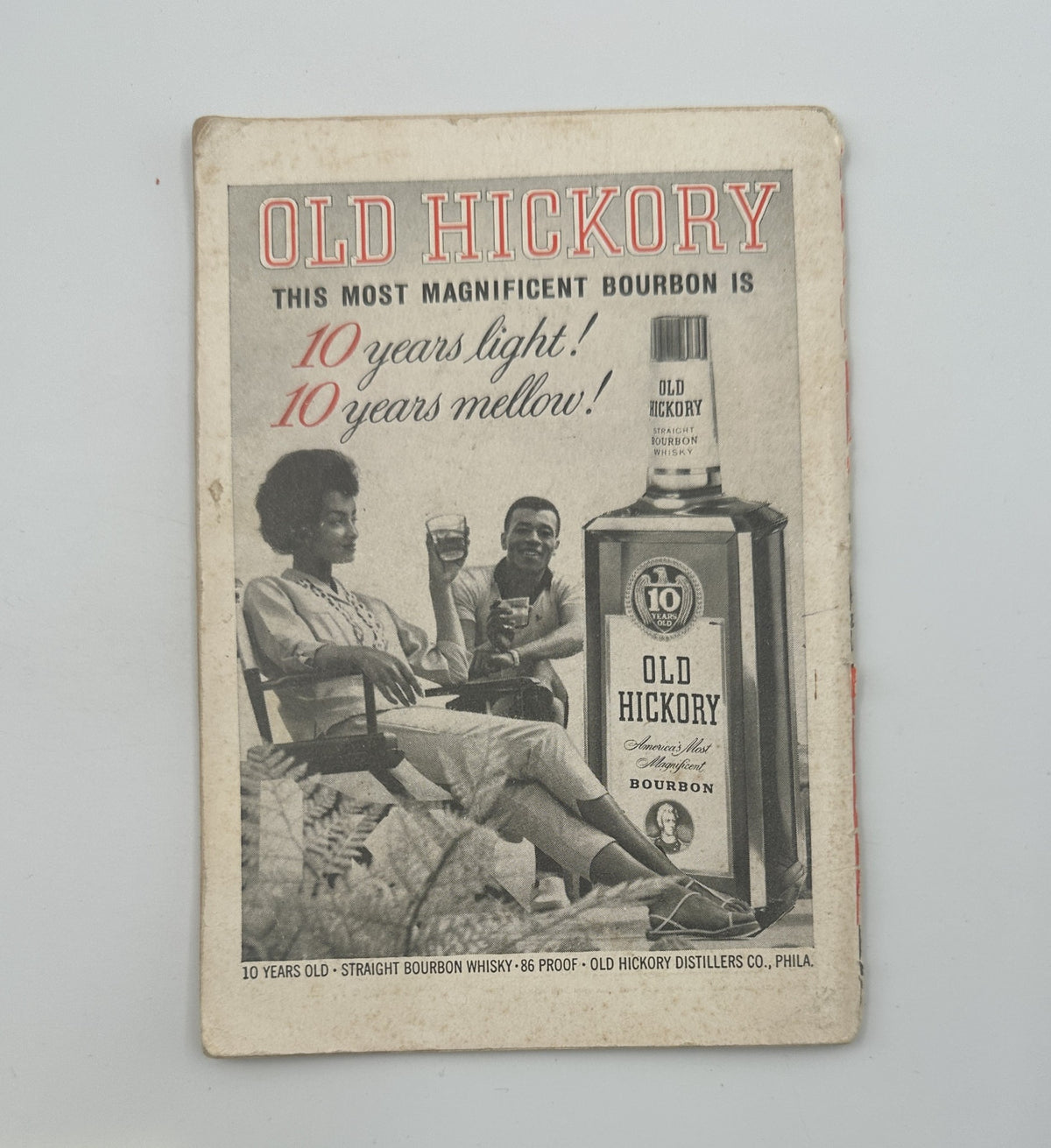 Advertisement for Old Hickory Bourbon from Jet Magazine, emphasizing its quality as '10 years light! 10 years mellow!'.