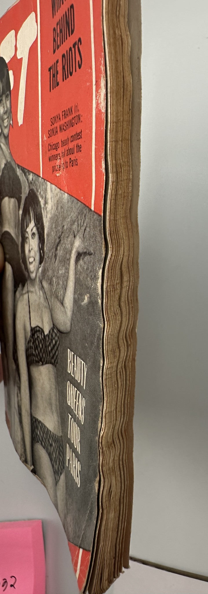 Side view of Jet Magazine August 4, 1966 showcasing the tattered edges and spine, emphasizing the magazine's vintage quality and reader condition.