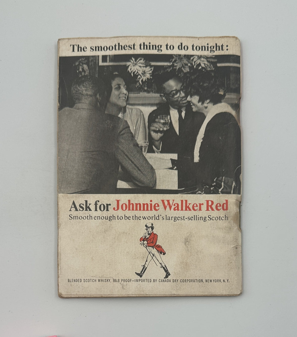 Back cover of Jet Magazine August 4, 1966 featuring an advertisement for Johnnie Walker Red whiskey, highlighting the product and the era's marketing style.