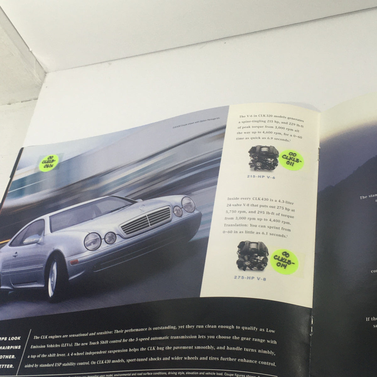 Detailed specifications page from the 2000 Mercedes-Benz CLK-Class Dealership Car Auto Brochure Catalog displaying engine options and performance.