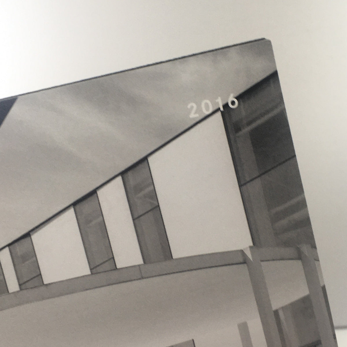 Cover of the 2016 Mercedes-Benz GLC-Class Polished Mettle Dealership Auto Brochure Catalog showing modern architecture.