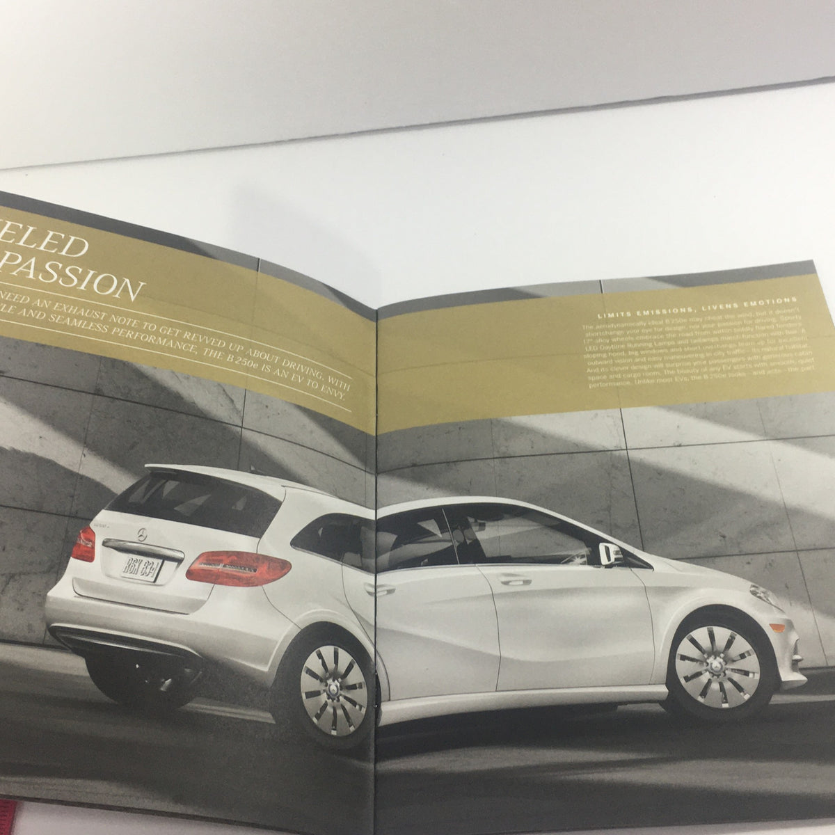 2016 Mercedes-Benz B-Class Electric Drive Dealership Auto Brochure showcasing the exterior design of the vehicle with a sleek side view.