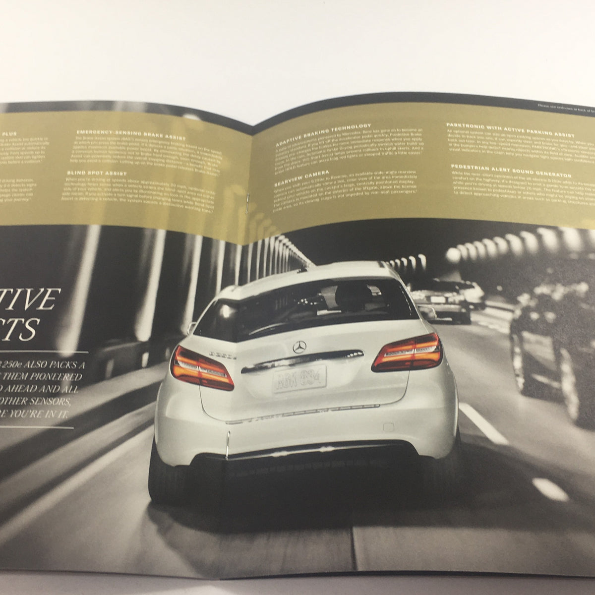 2016 Mercedes-Benz B-Class Electric Drive Dealership Auto Brochure highlighting the rear view of the car while in motion through a tunnel.