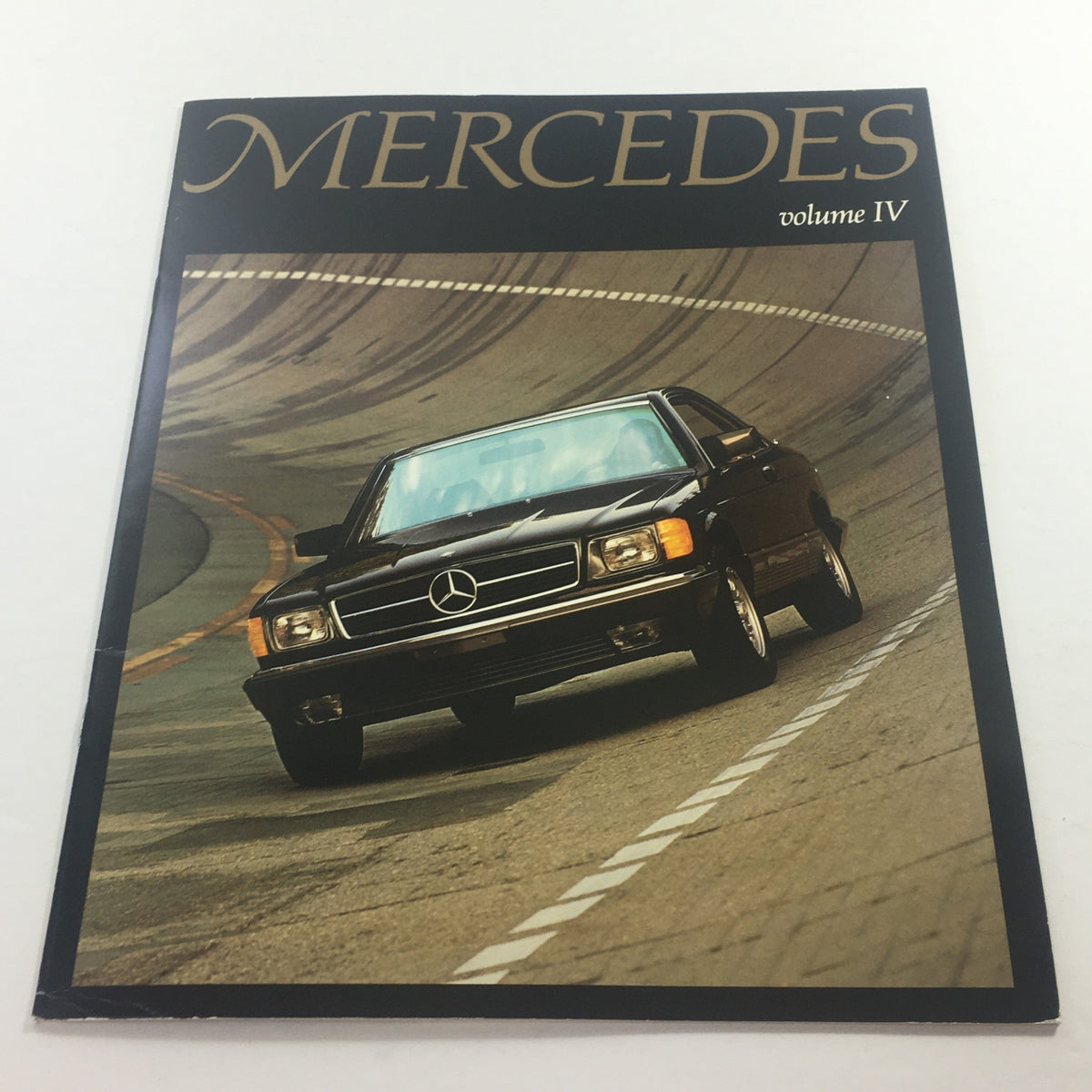 Cover of the 1981 Mercedes Volume 4 - 380SEC Coupe Dealership Car Auto Brochure Catalog featuring a sleek black 380SEC coupe on a racetrack.
