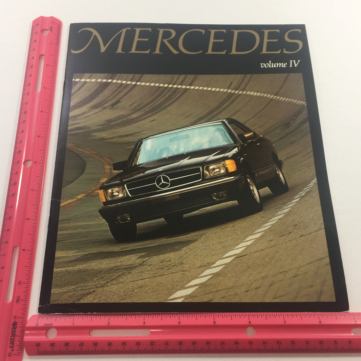 Front cover of the 1981 Mercedes Volume 4 - 380SEC Coupe Dealership Car Auto Brochure Catalog, displaying a sporty black 380SEC Coupe on a racetrack.