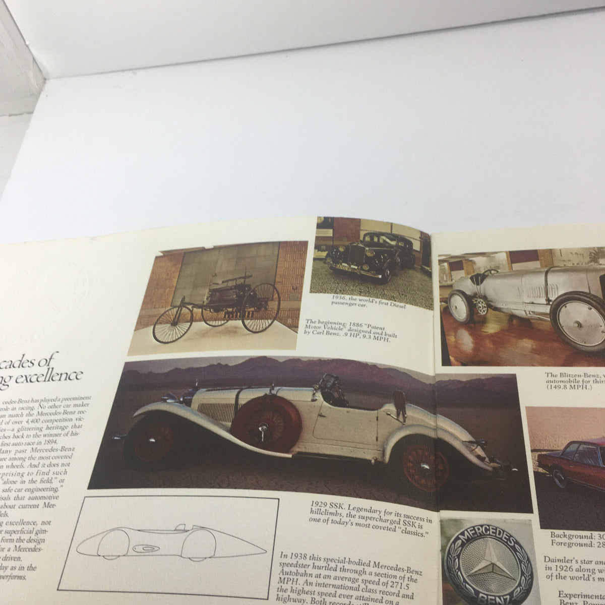Interior page of the 1954 Mercedes-Benz 300-SL Fuel Injection Dealership Car Auto Brochure Catalog featuring classic cars and historical images.