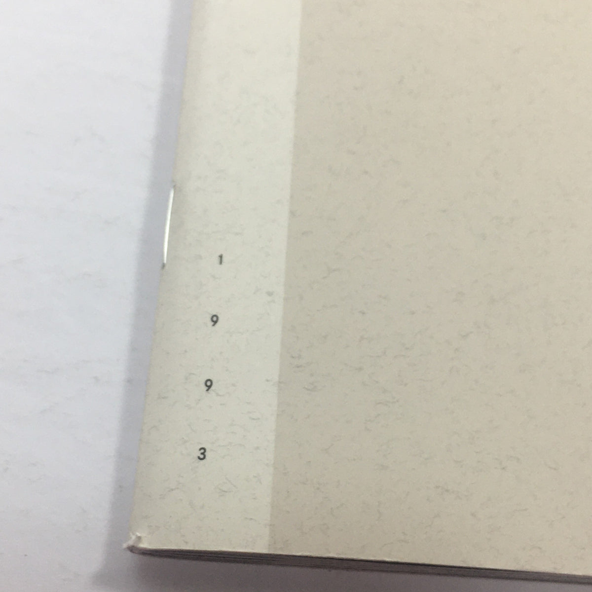 Side view of the spine of the 1993 Mercedes-Benz The Value Of Difference Dealership Car Auto Brochure Catalog showing the printed year 1993.