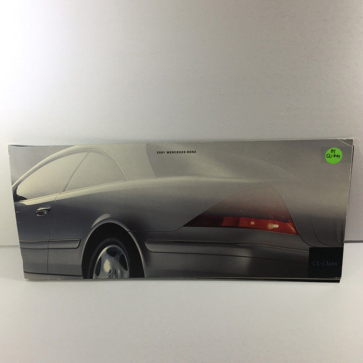 2001 Mercedes-Benz CL-Class Dealership Car Auto Brochure Catalog featuring a sleek side view of the vehicle, showcasing its elegant design.